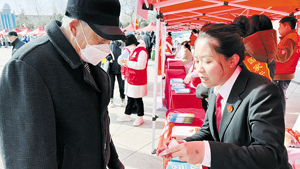 法暖春“锋”十里 志愿普法伴你